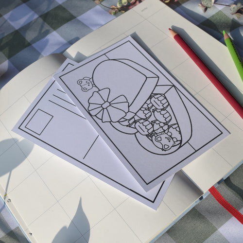 Cute box of chocolates with bear and cat characters on a colorable post card